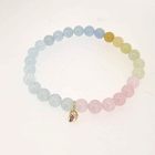 Armband Pura met rozenkwarts en beryl kralen, gouden druppelbedel met rozen diamant